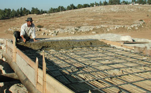 Pouring a new concrete roof for the four-room house