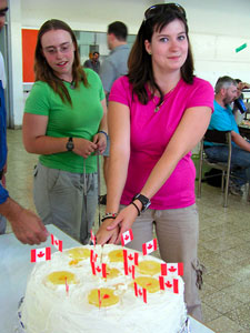 Barbara van Vierssen Trip and Erin Carr from Calgary at the Canada Day cake (photo by Katie Van Petten)