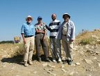 Doug Clark and Larry Herr surrounding Adeib Abu-Schmays and Jihad Haroun of the Department of Antiquities