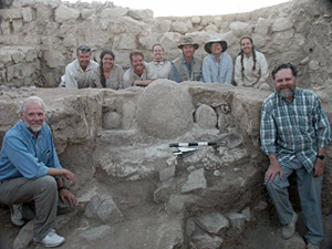 Votive Niche and Its Excavators (rear from left: Ralph Kneller (helped prepare for photo), Janelle Worthington, Matt Vincent, Janelle Lacey, Kent Bramlett (Field B Supervisor), Carolyn Waldron, Monique Acosta and Doug Clark and Larry Herr flanking in the front)