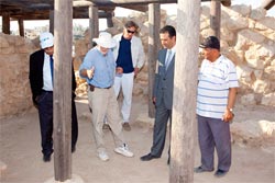 Standing in the four-room house, from left HE Akel Biltaji Douglas Clark Kent Bramlett HE Nayef Al Fayez Abdelrahim Al Dwikat